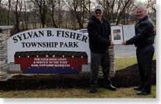 Sylvan B. Fisher Park sign